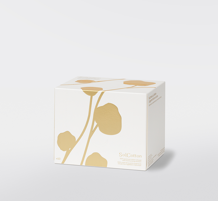 White square box of skincare cotton towelette 100% with gold floral design 